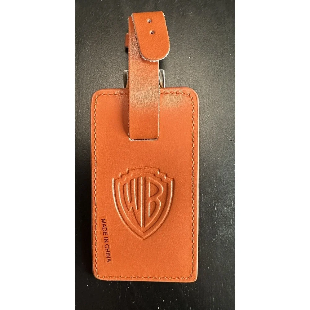 Rare Warner Brothers studios WB promotional crew leather luggage tag Orange